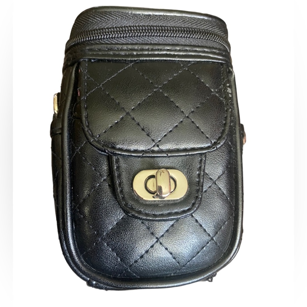 Icon crossbody or tiny belt bag in black. Good condition.